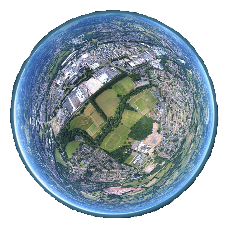 Earth: Our Shared Home A fish-eye perspective of Earth zoomed in to reveal the details of parks, neighborhoods, and shopping centers. A hazy blue border surrounds the edge of the sphere.