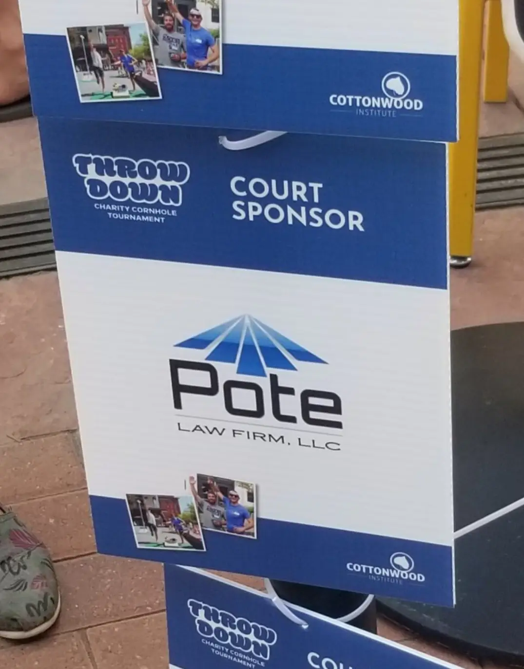 Cottonwood Institute's 11th Throwdown The beautiful logo for Pote Law Firm on a court sponsorship sign at Cottonwood Institute's 11th Throwdown